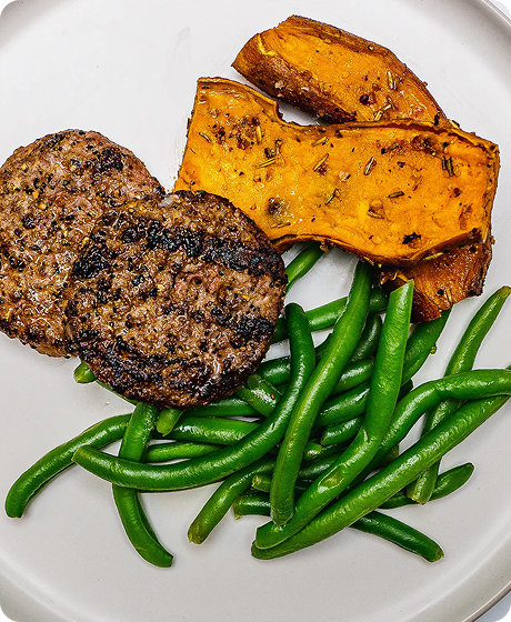 Prepared gluten-free meal with steak and vegetables