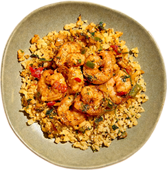 Bourbon shrimp over cauliflower grits